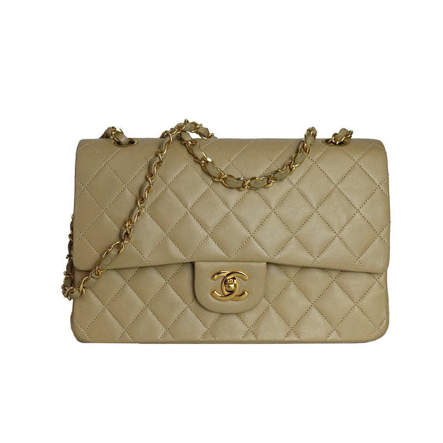 Chanel vintage medium Classic Double Flap bag in beige lambskin leather. 