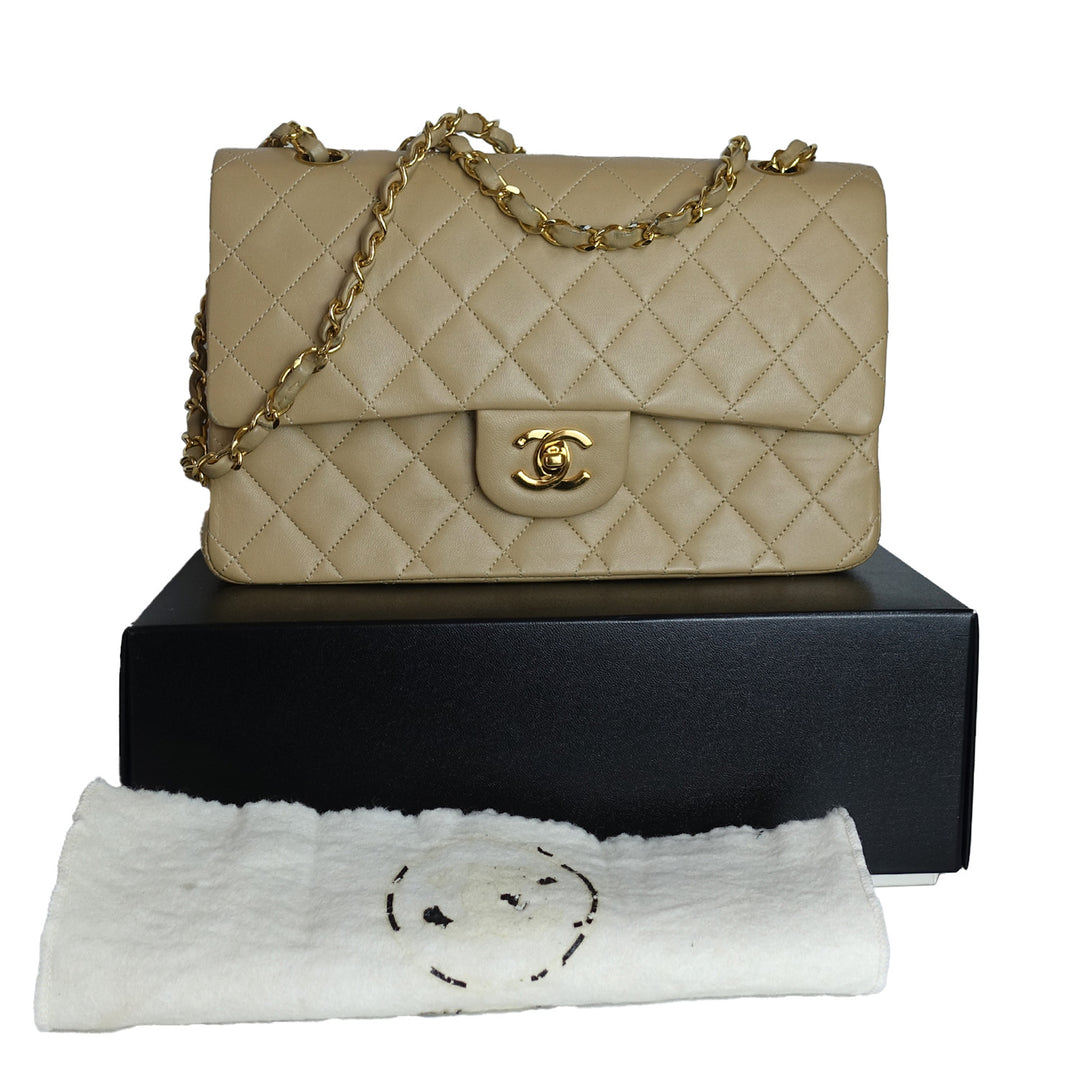 This vintage Chanel classic double flap bag comes with the original box and dust bag. 
