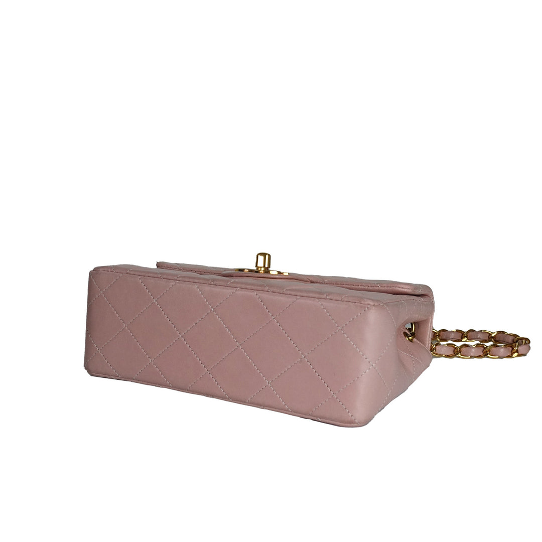 This vintage Chanel bag features a quilted lambskin bottom. 