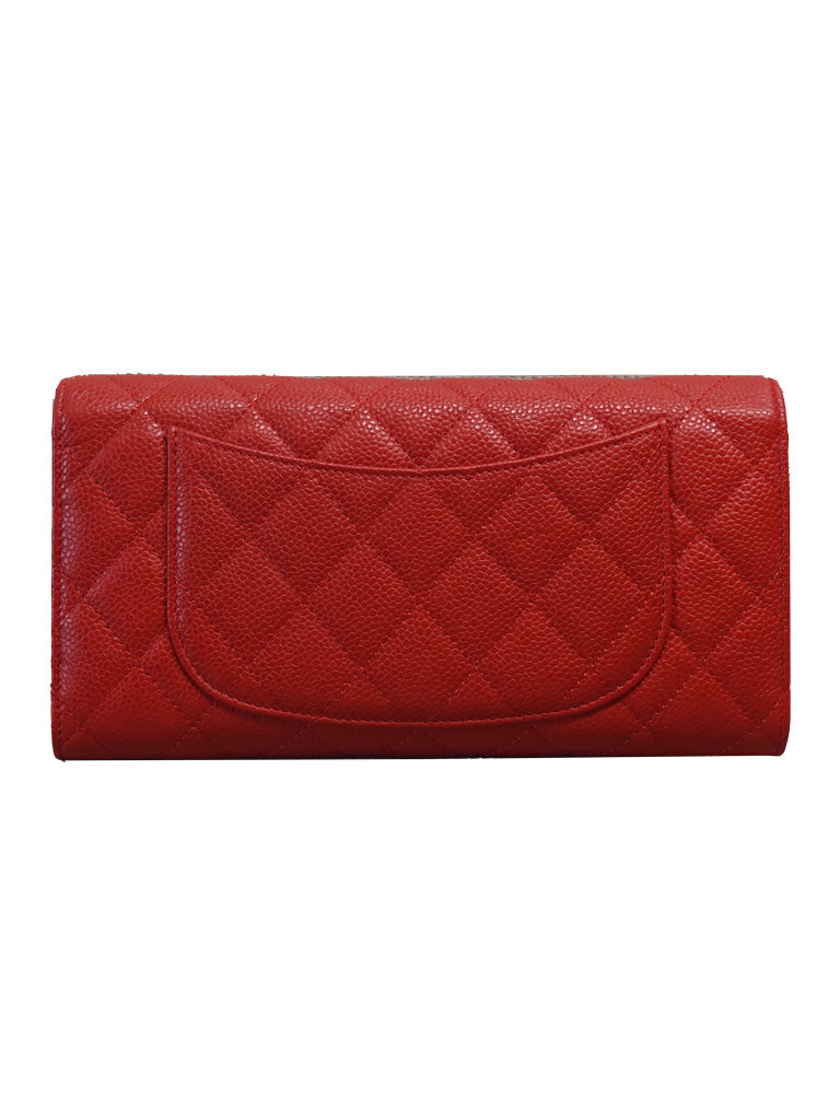 Back view of the preloved Chanel long wallet with a slip pocket.