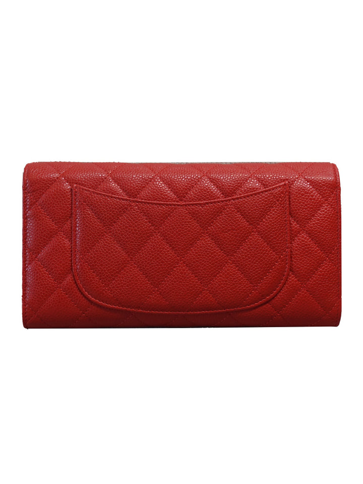 Back view of the preloved Chanel long wallet with a slip pocket.