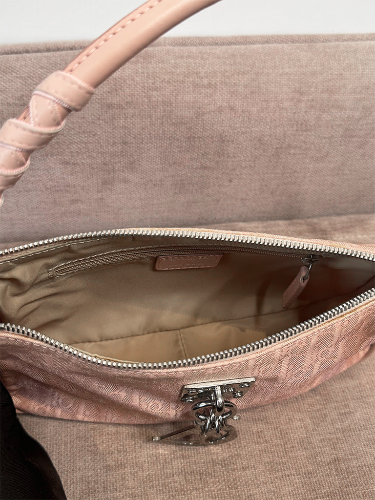 Interior lining and zip pocket of the Vintage Dior Lovely shoulder bag.