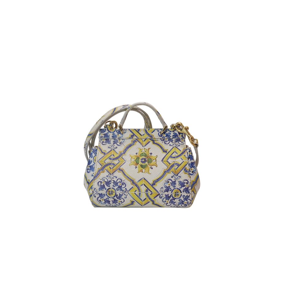 Handbag with floral and geometric pattern in blue and yellow. 