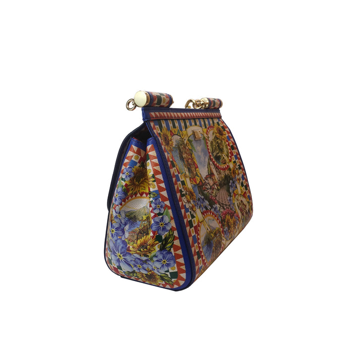 The handbag features a leather top-handle with gold-toned hardware links and leather anchors.
