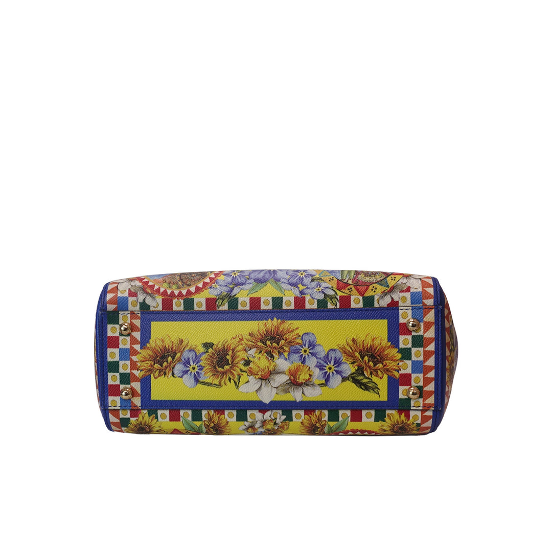 The handbag features 4 protective feet on the bottom. 