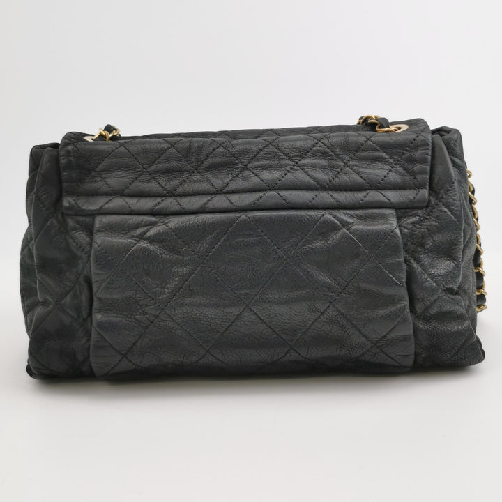 Chanel Chic Quilt Accordion Flap Bag In Black Leather