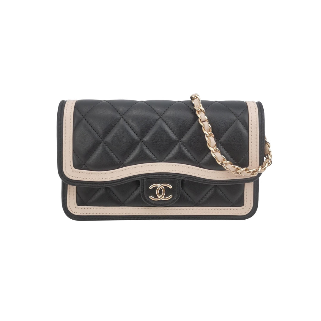 Chanel Wallet On Chain in Black Quilted Lambskin with Pink Trim
