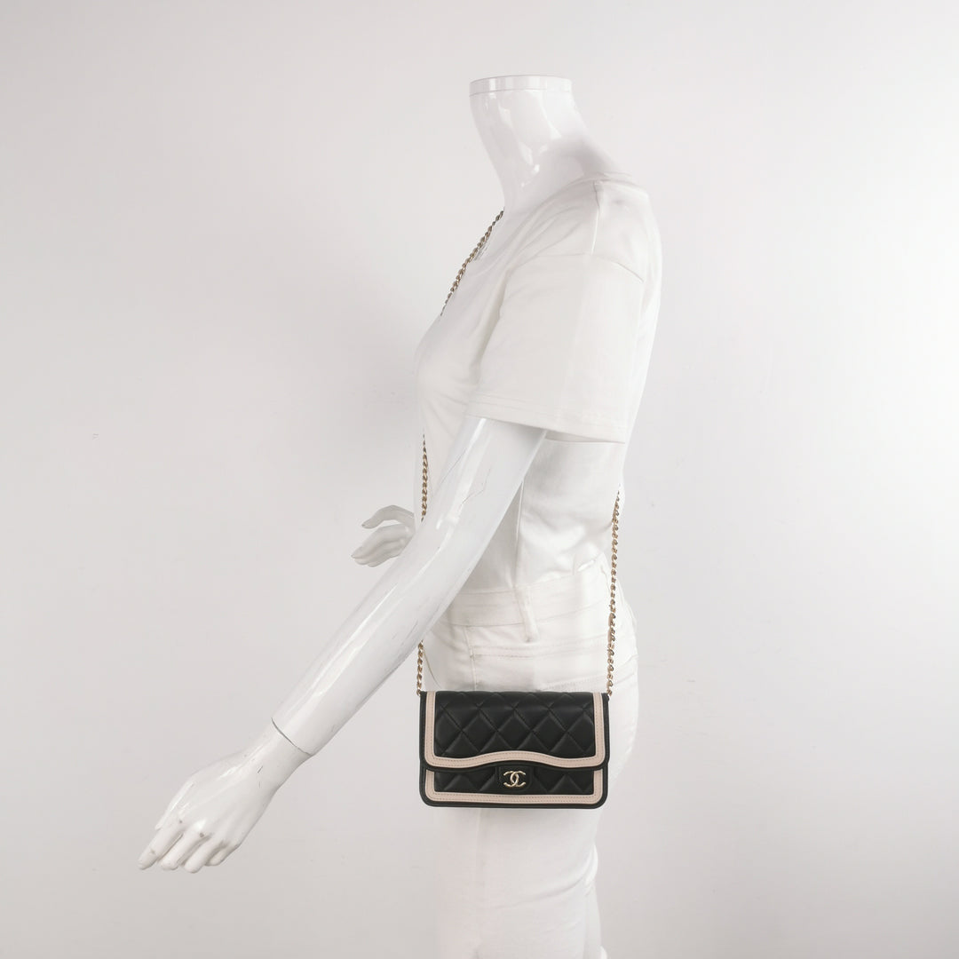 Chanel Wallet On Chain in Black Quilted Lambskin with Pink Trim