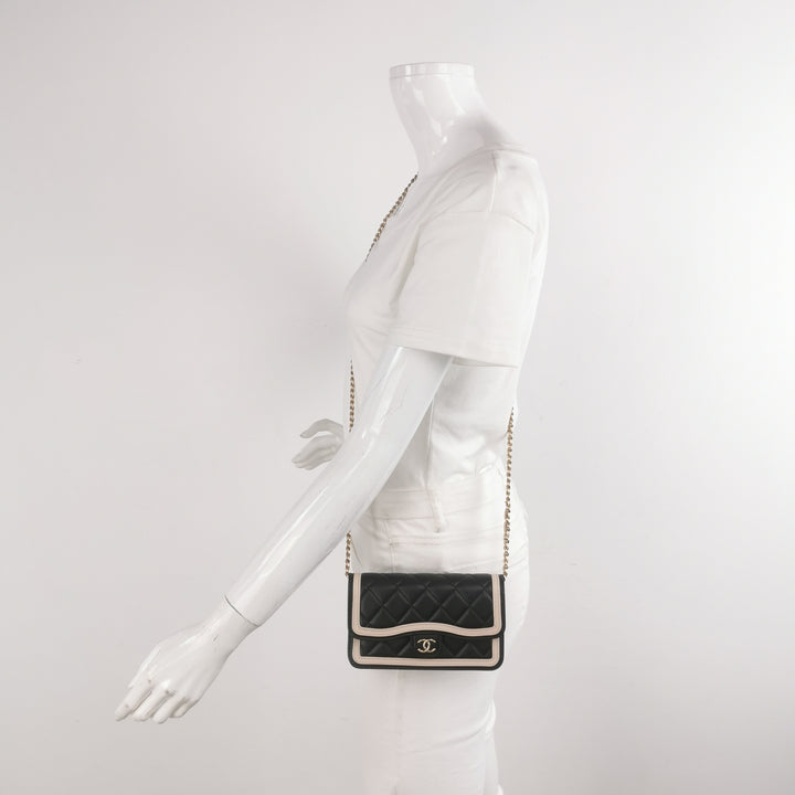 Chanel Wallet On Chain in Black Quilted Lambskin with Pink Trim