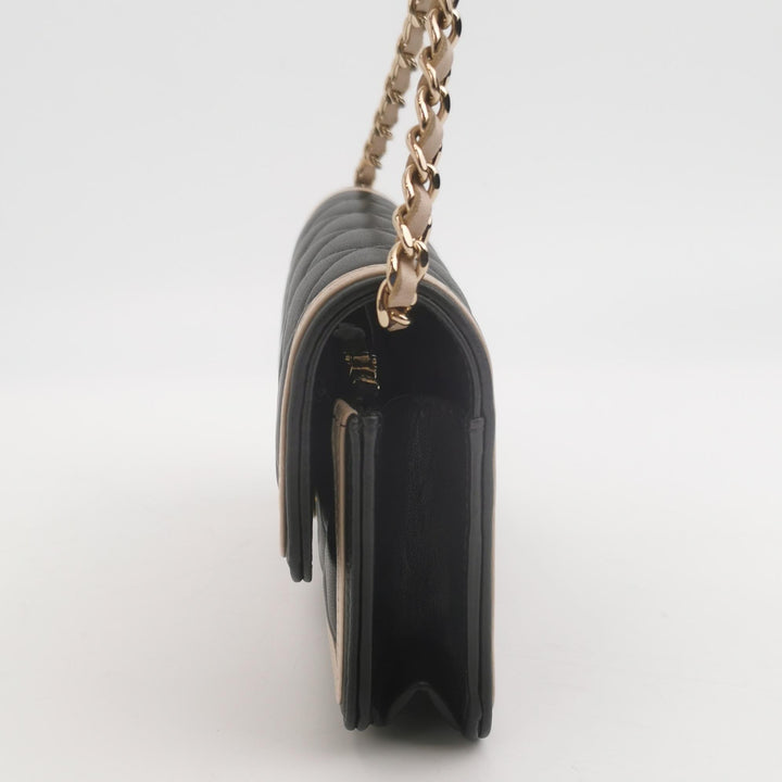 Chanel Wallet On Chain in Black Quilted Lambskin with Pink Trim