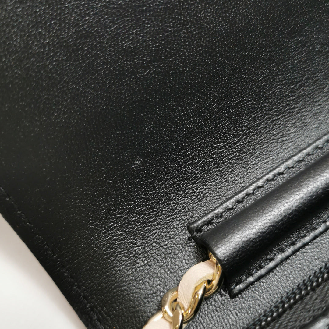 Chanel Wallet On Chain in Black Quilted Lambskin with Pink Trim