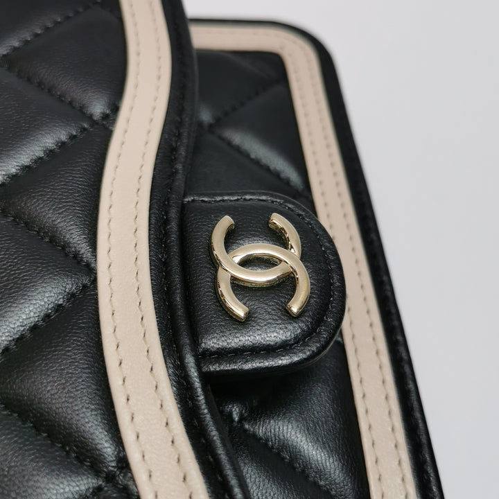 Chanel Wallet On Chain in Black Quilted Lambskin with Pink Trim