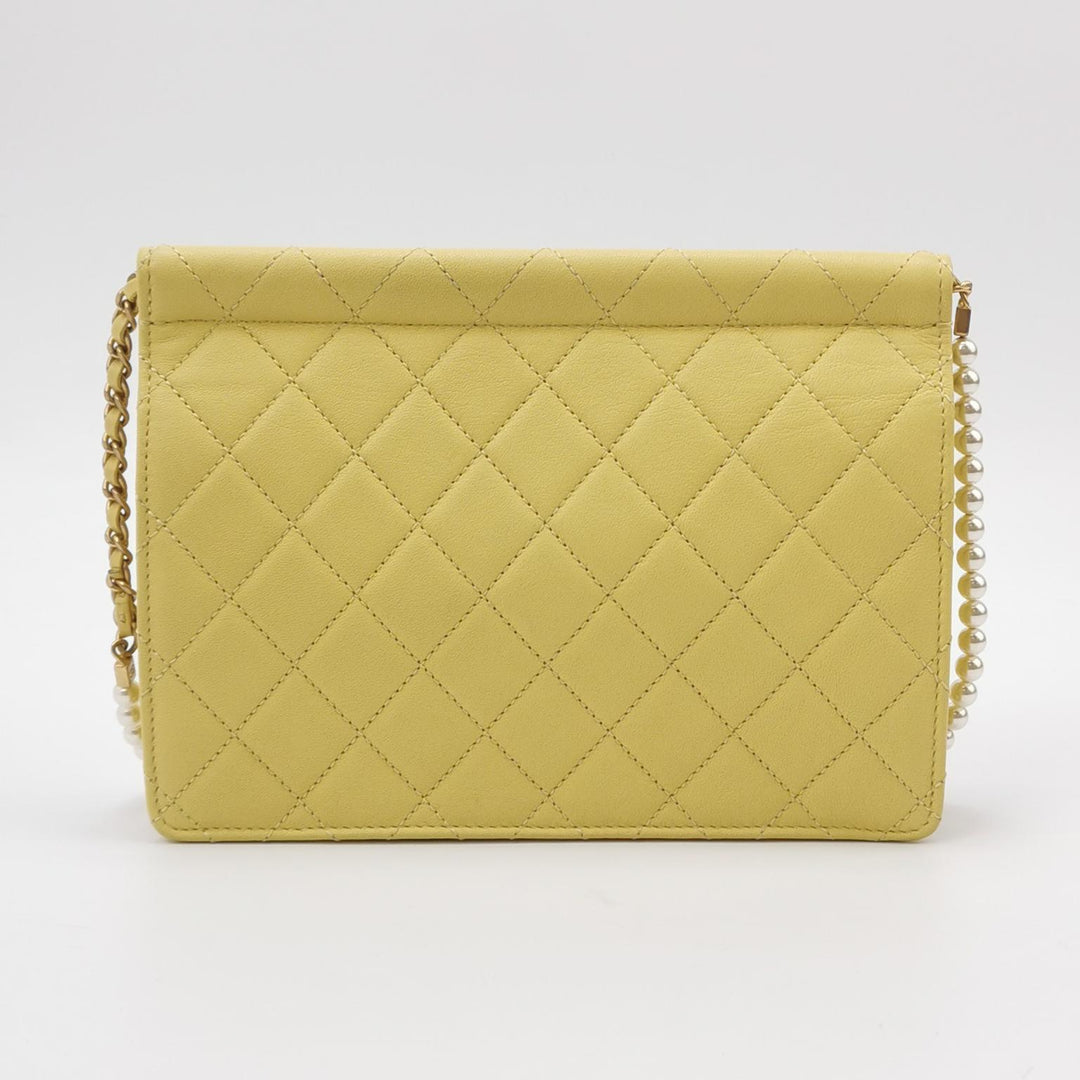 Chanel Medium Lambskin Chic Pearls Flap Bag Yellow