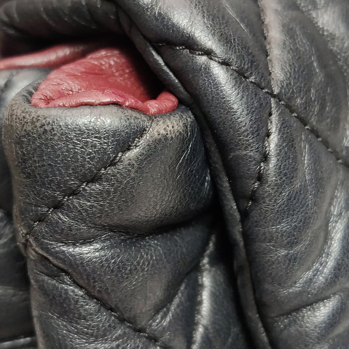 Chanel 2010 Coco Cocoon Quilted Lambskin Backpack In Black