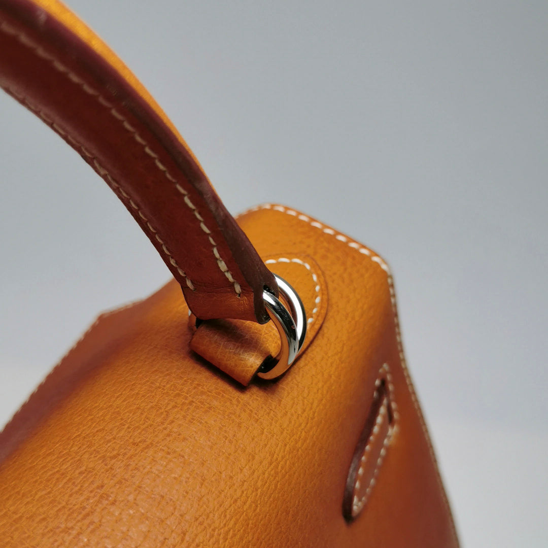 Hermes 25 Kelly Paeu de Porc Leather Toffee Colour Palladium Hardware