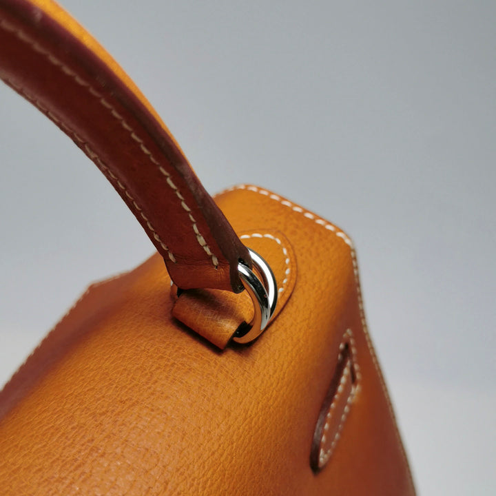 Hermes 25 Kelly Paeu de Porc Leather Toffee Colour Palladium Hardware