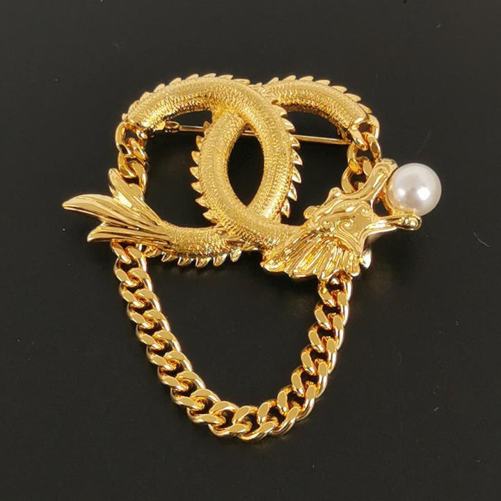 Chanel 2024 Faux Pearl CC Lunar New Year Dragon Brooch