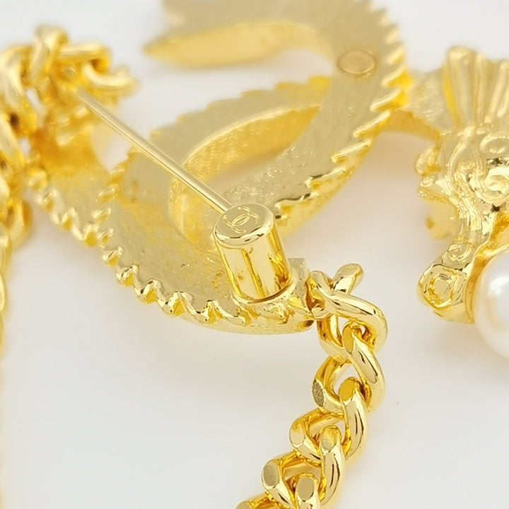Chanel 2024 Faux Pearl CC Lunar New Year Dragon Brooch