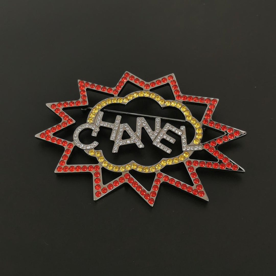 Chanel Strass Logo Burst Brooch