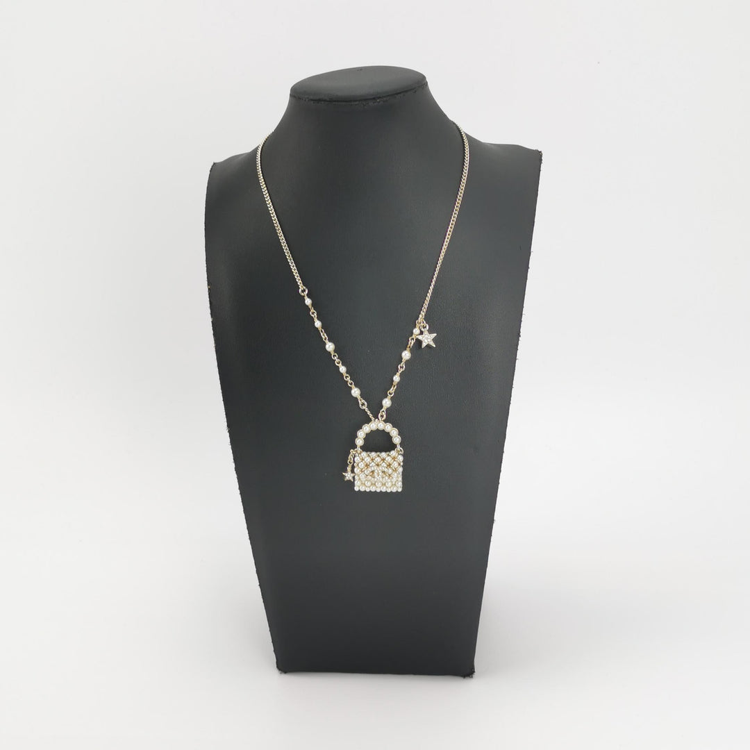 Chanel Little Bag Pendent Faux Pearl Necklace CC Logo