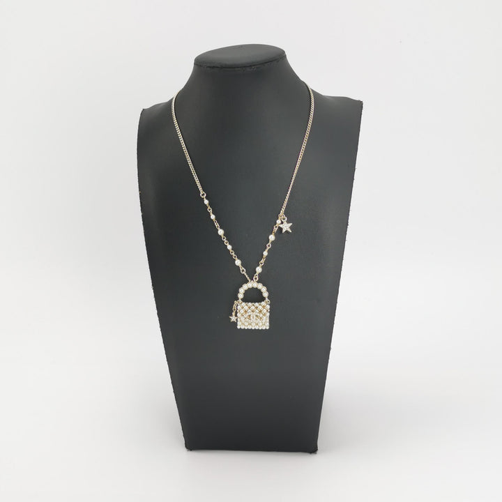 Chanel Little Bag Pendent Faux Pearl Necklace CC Logo