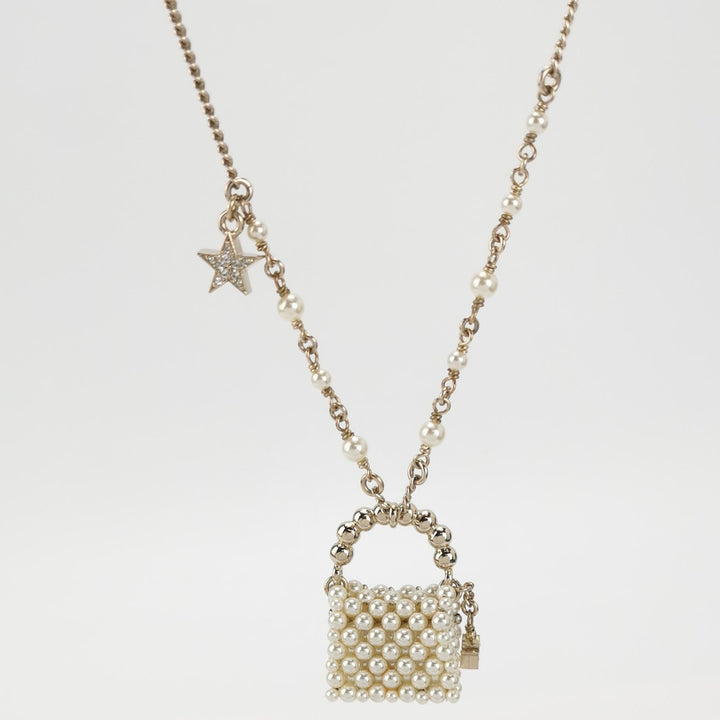 Chanel Little Bag Pendent Faux Pearl Necklace CC Logo