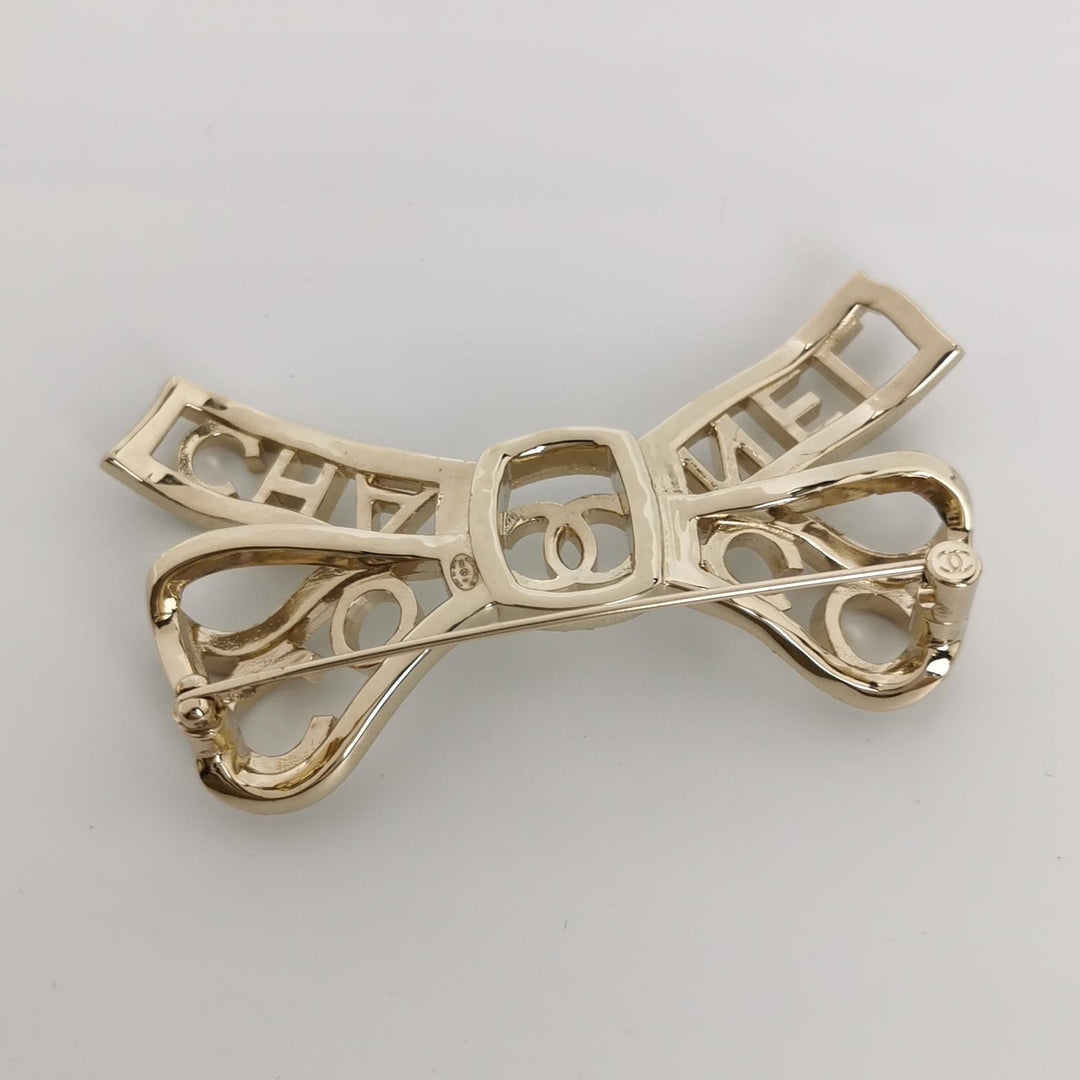 Chanel Metal Crystal Bow-tiful CC Brooch Gold