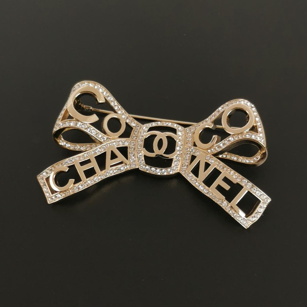 Chanel Metal Crystal Bow-tiful CC Brooch Gold