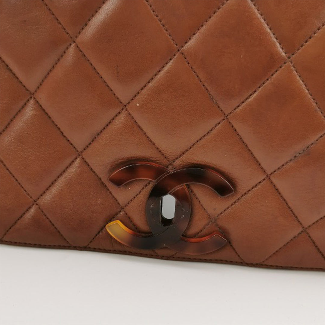 Chanel 1994 Lambskin Brown Quilted Tortoiseshell Round Messenger Flap Bag