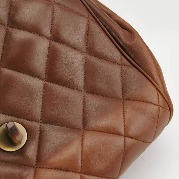 Chanel 1994 Lambskin Brown Quilted Tortoiseshell Round Messenger Flap Bag