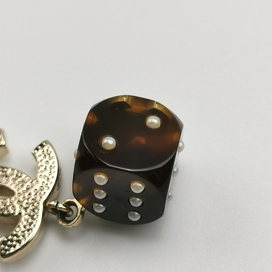 Chanel CC Logo Dice Brown Crystal Dangle Earrings