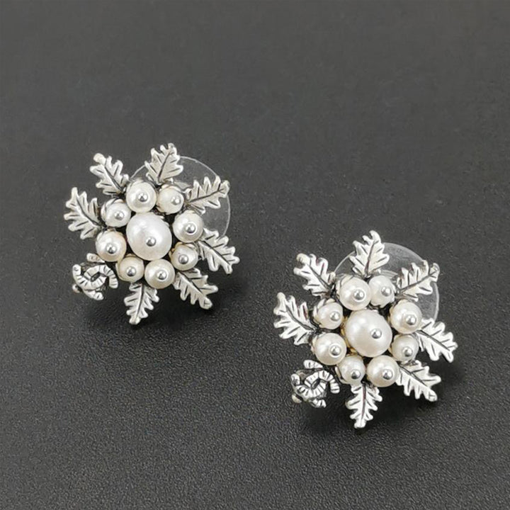 Chanel Snowflake And Pearl Clip On Earrings