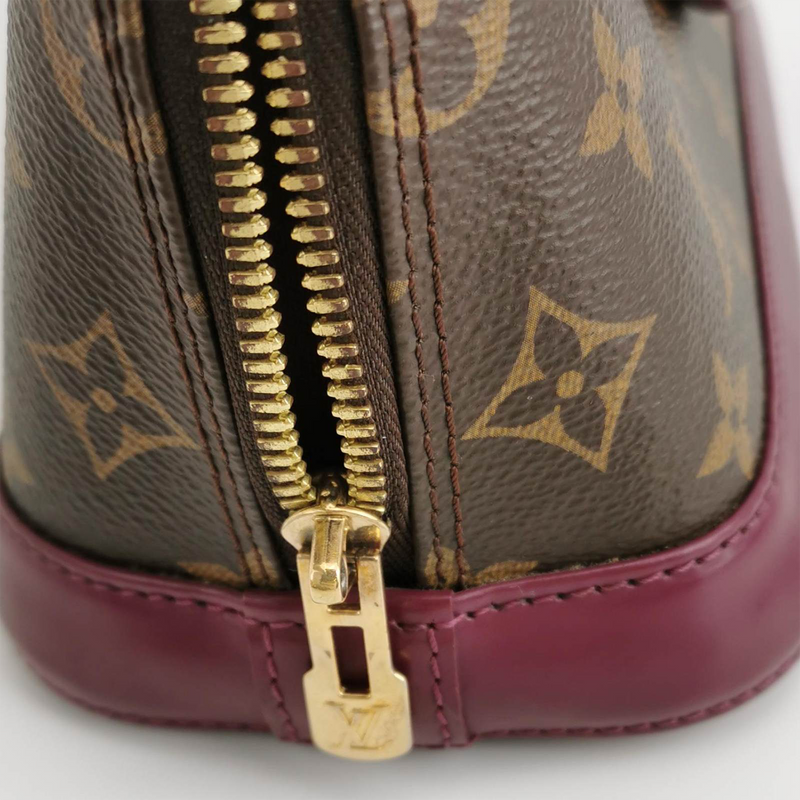 Louis Vuitton Alma BB Edition Totem bag in brown monogram canvas