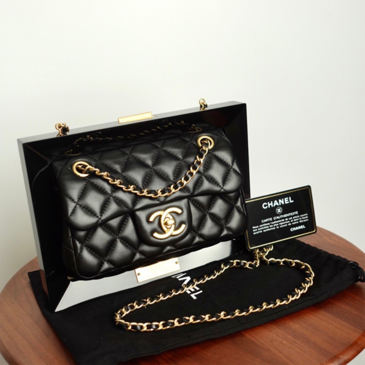 A LIMITED EDITION BLACK LUCITE & LAMBSKIN LEATHER FRAME BAG, CHANEL, 2014