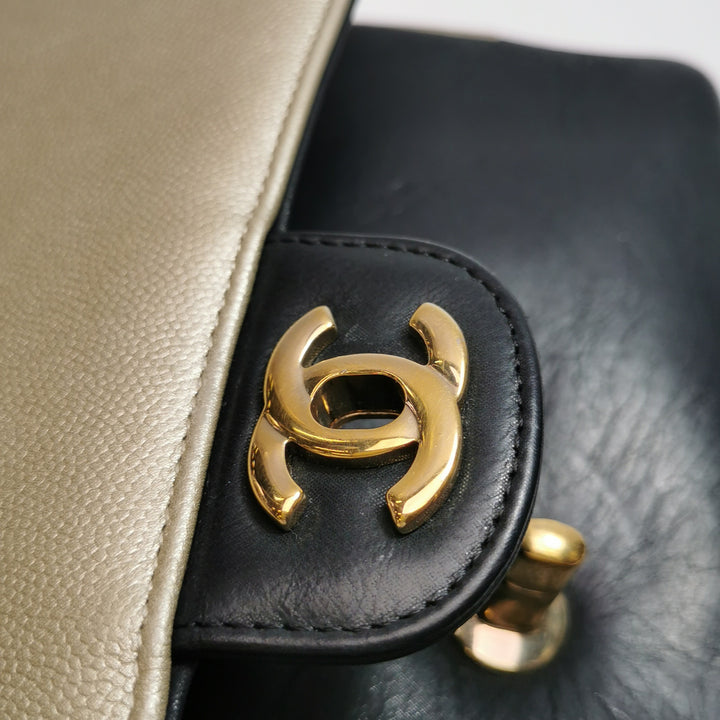 Chanel Medium Double Flap Caviar Calfskin Duo Light Gold Black