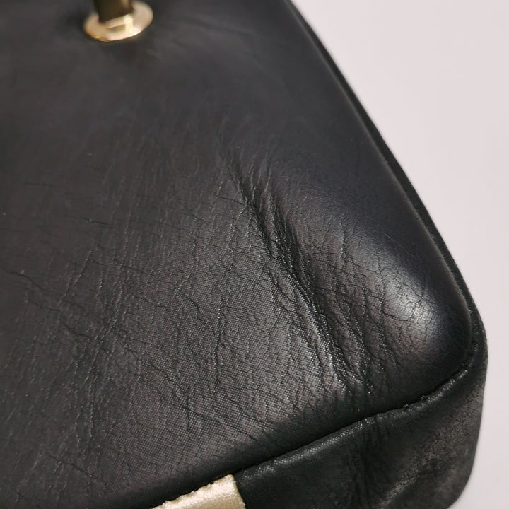 Chanel Medium Double Flap Caviar Calfskin Duo Light Gold Black