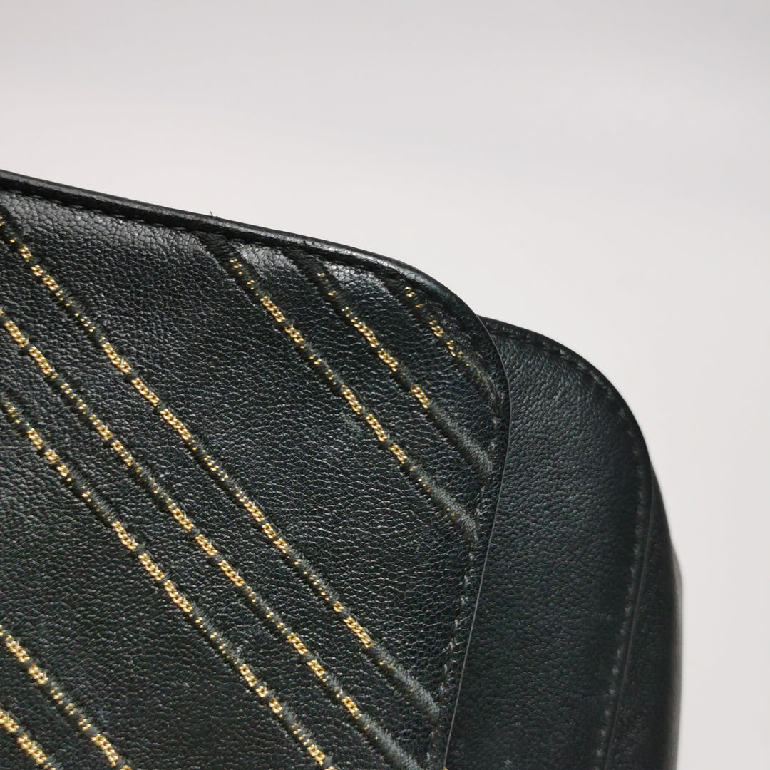 Chanel Chevron Subtle Flap Bag Black Gold Detail