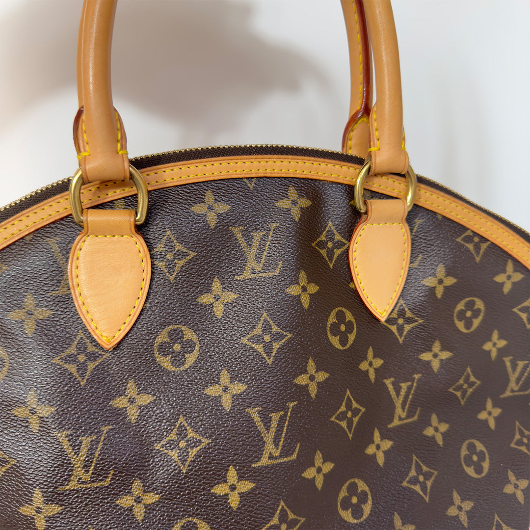 Louis Vuitton Vintage Lockit Vertical Handbag in Monogram Canvas