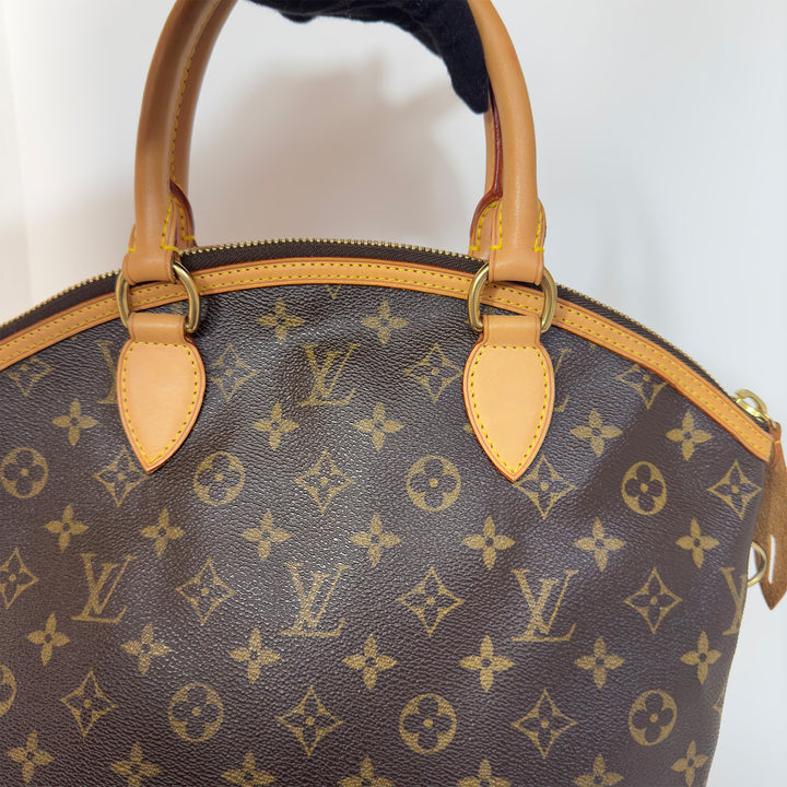 Louis Vuitton Vintage Lockit Vertical Handbag in Monogram Canvas