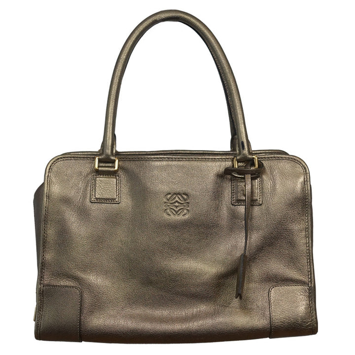 Authentic Vintage Loewe Amazona in size 35cm, with gold leather and gold hardware.