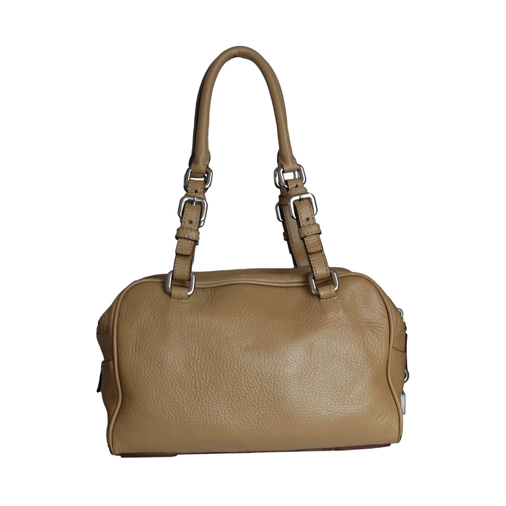 The back of the vintage Prada shoulder bag in beige. 