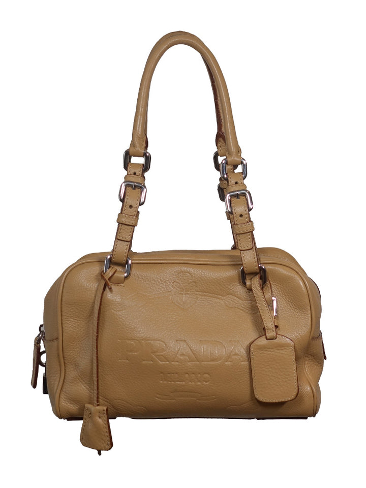 Authentic Vintage Prada Canapa Logo shoulder bag in beige with silver hardware.