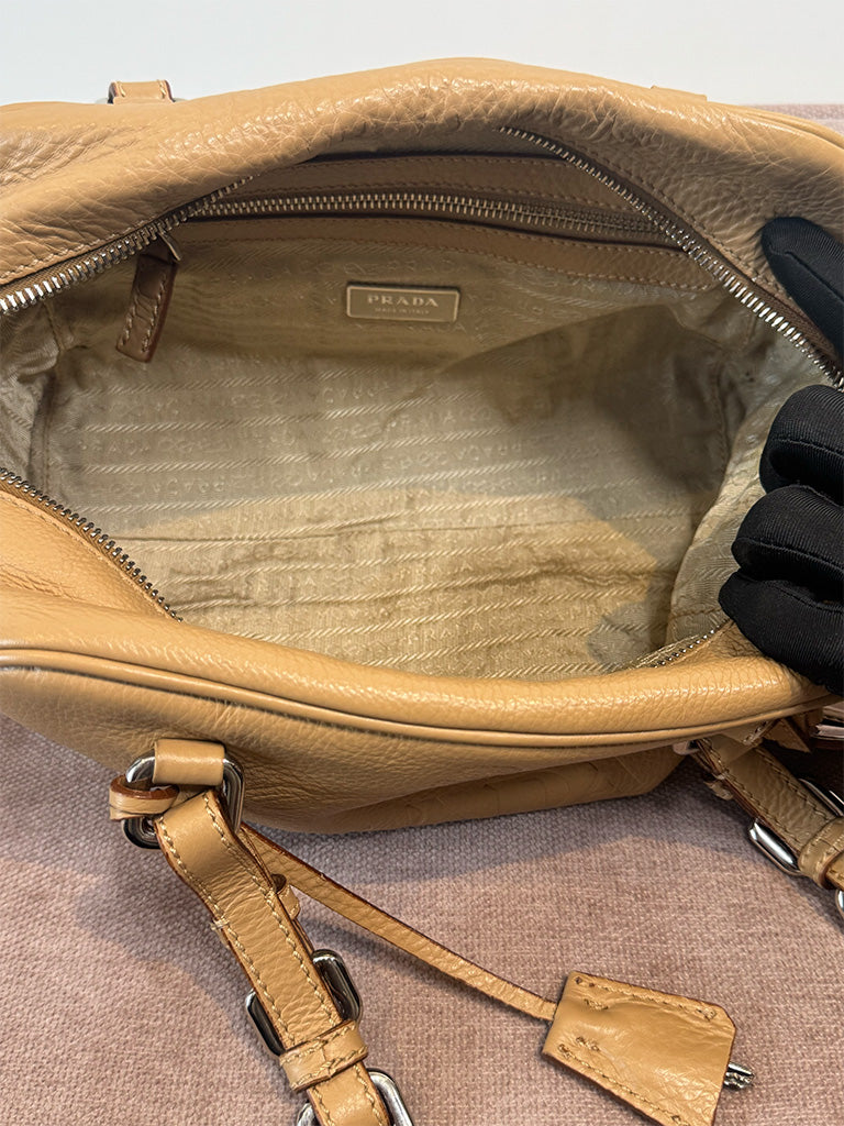 Interior lining and zip pocket of the vintage Prada shoulder bag.