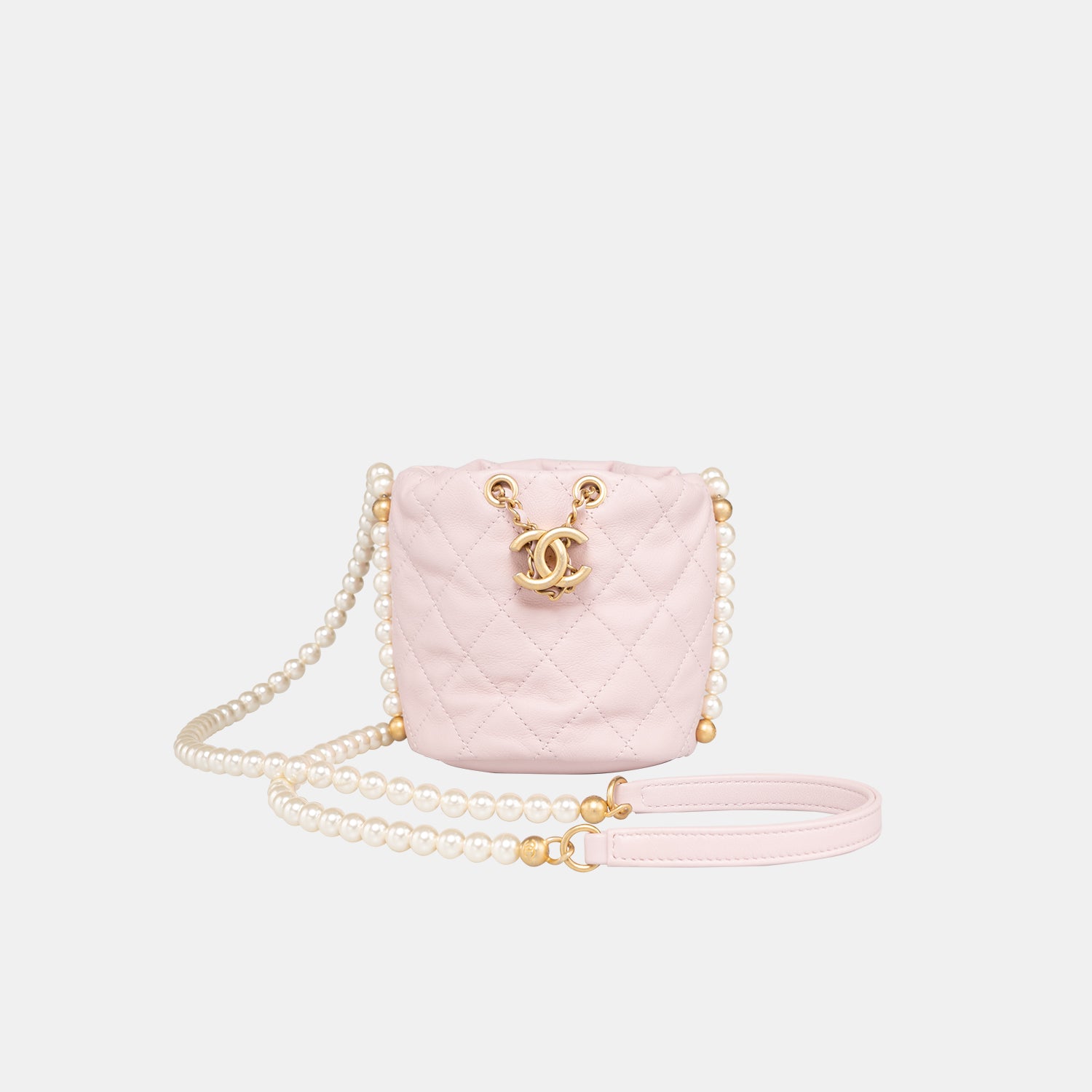Chanel Quilted Pearl Chain Mini Drawstring Bucket Light Pink Bag – Trésor  Vintage