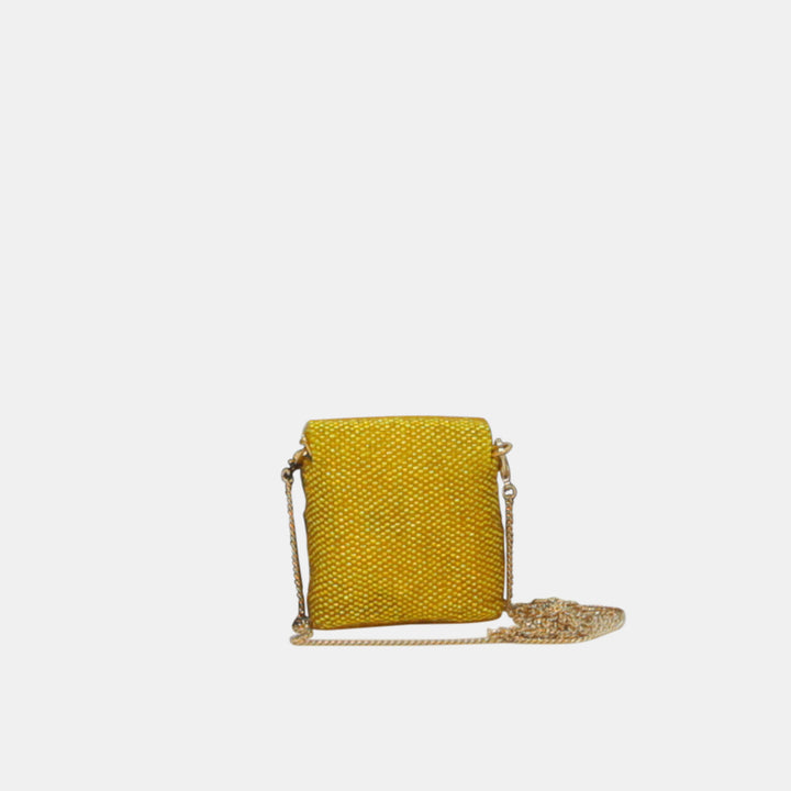 This pico baguette bag is made with yellow beads. 