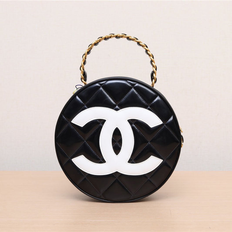Chanel *Ultra Rare* Vintage Patent Leather Round Handbag In Black And White CC Logo