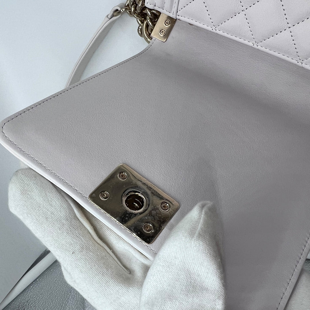 Chanel Boy White North South bag In Gold Hardware
